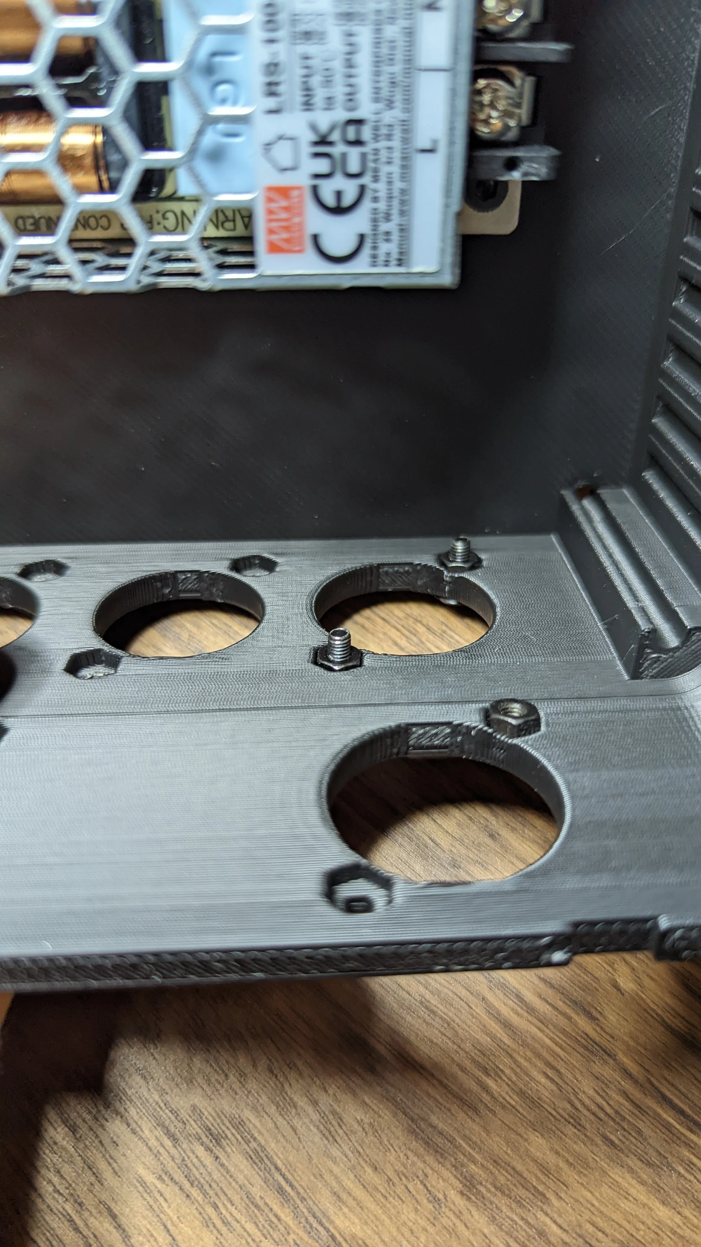 Picture showing closeup of design feature meant to hold panel mounted jacks in place