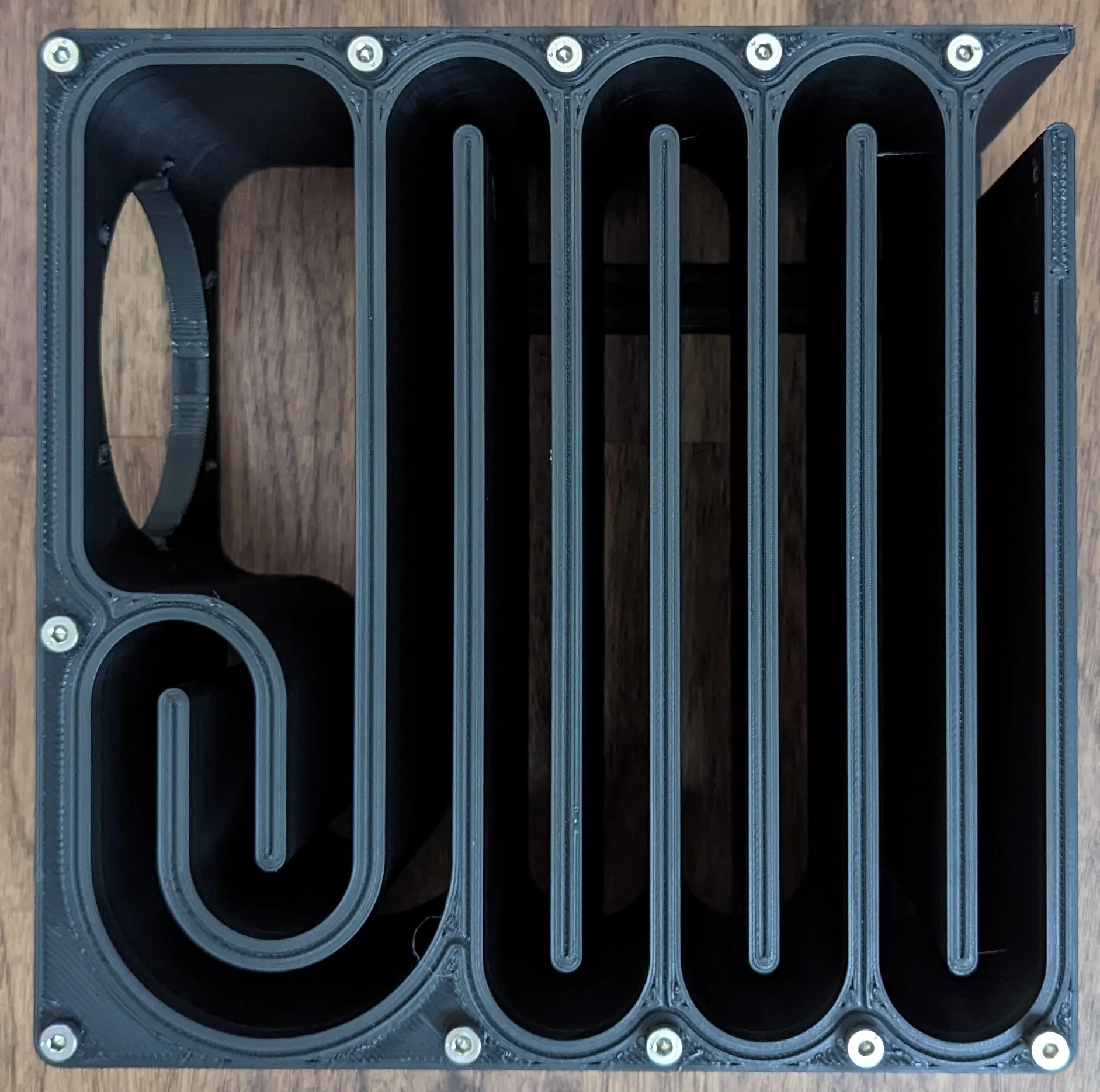 All 11(!) of the m4 screws driven into the sub body waiting for the plastic to set