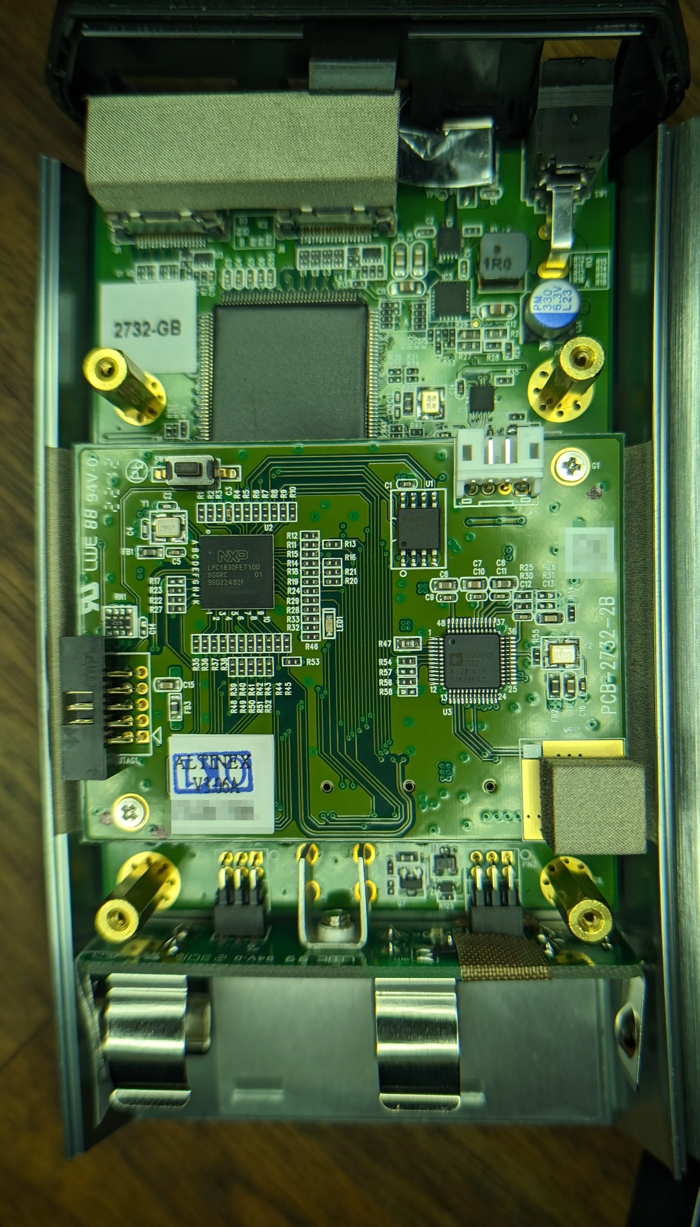 Internals feature three PCBs.