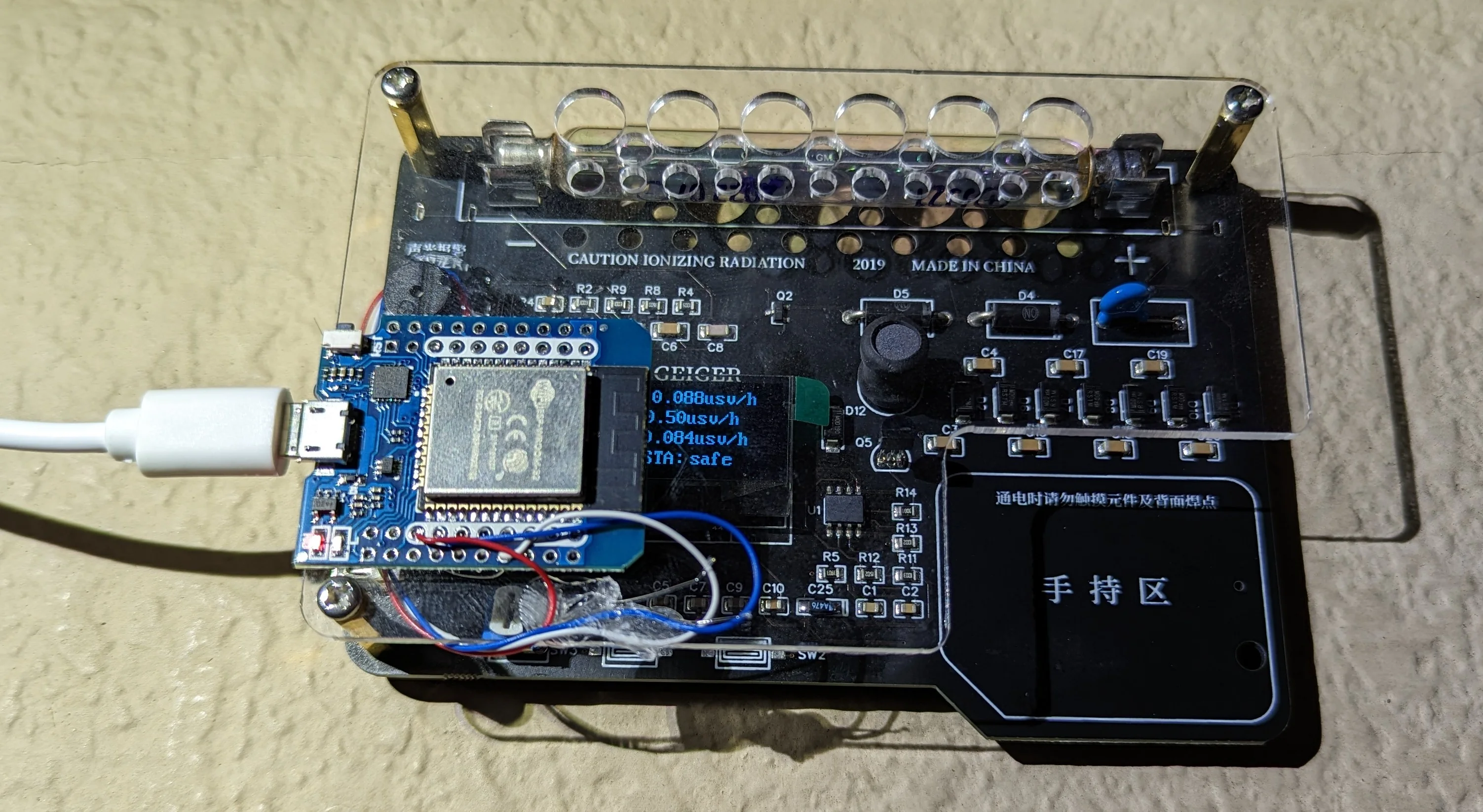 There's no good place for the ESP module so I chose to strategically obfuscate the portion of the screen that does not display the actual measurements.
