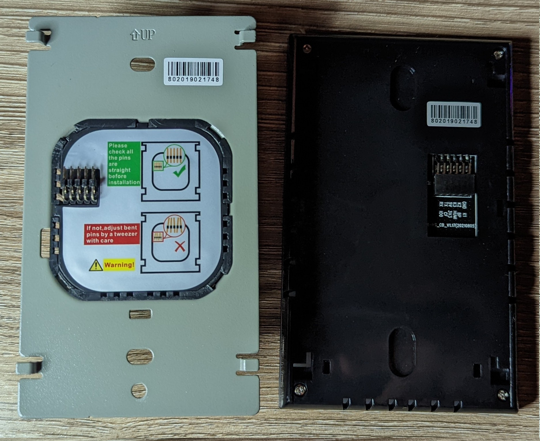 Picture showing the rear of the switch screen panel and the front of the power module that would be installed in the wall.