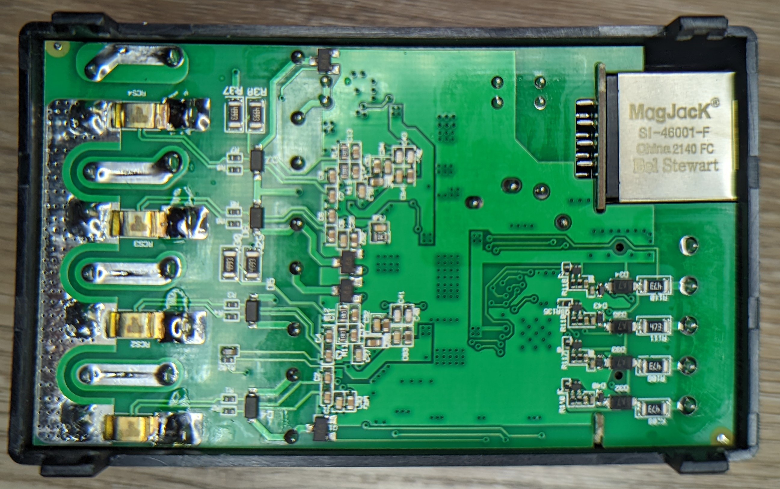Picture showing the first and largest PCB inside the device. Accessible immediately after removing the rear