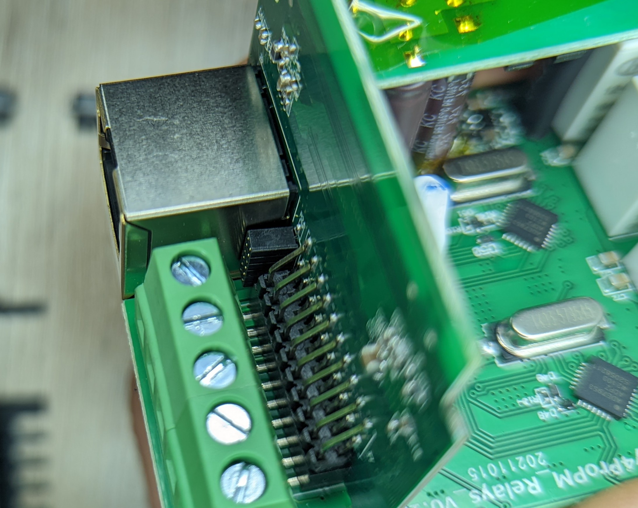 Picture showing what appears to be a debug connector next to the ethernet jack.