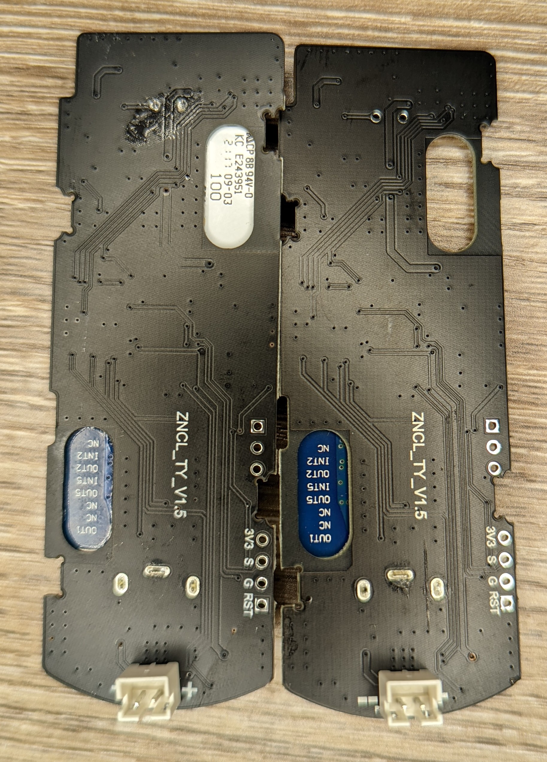Photo showing closeup of the read of the main PCBs from both units side by side.