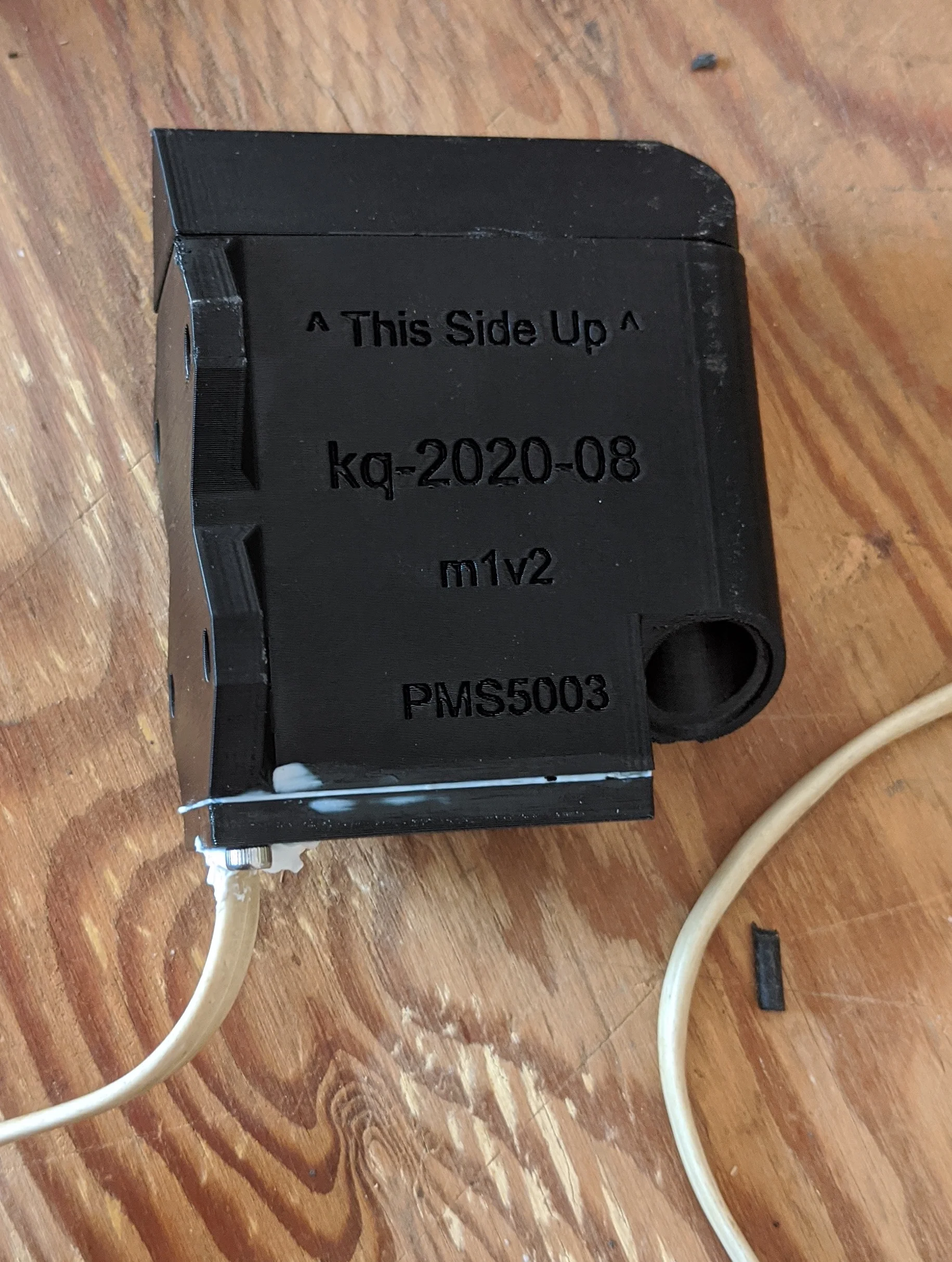 Picture showing assembled components while glue/caulk curing