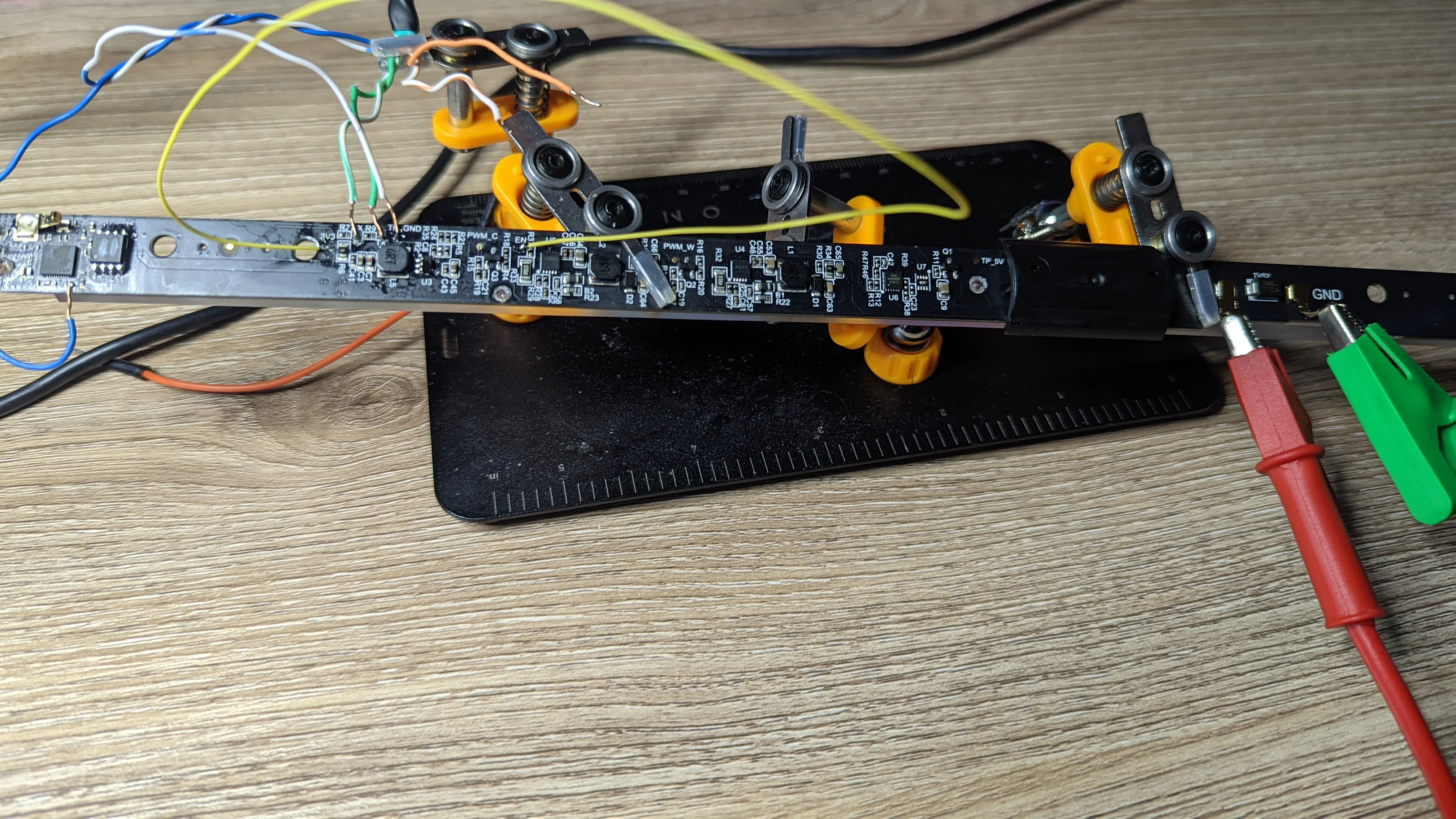 Picture showing the various jumper wires and other soldered connections needed to flash Tasmota to the PCB