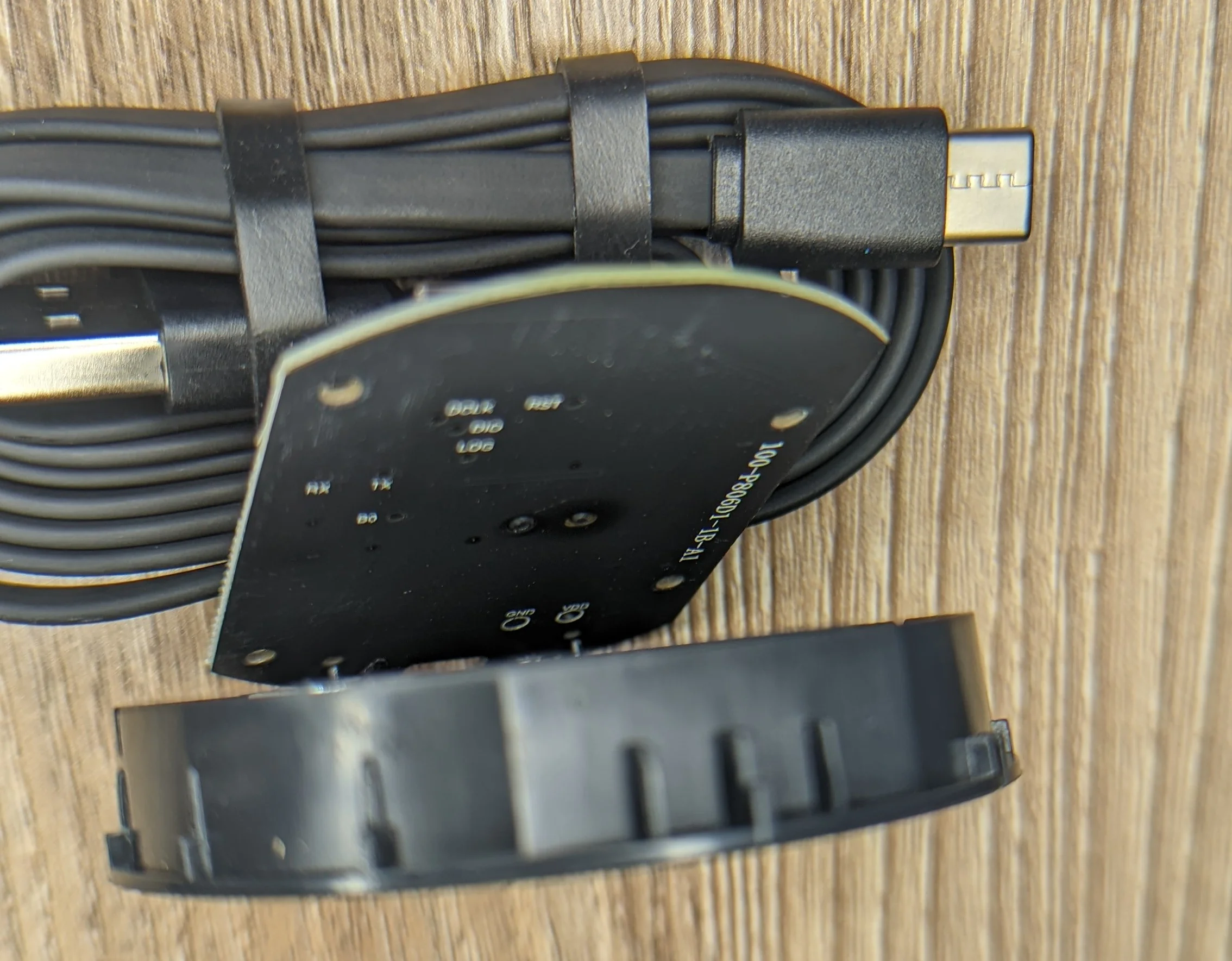 Photo of the remote puck PCB underside showing some of the test points and other PCB markings.